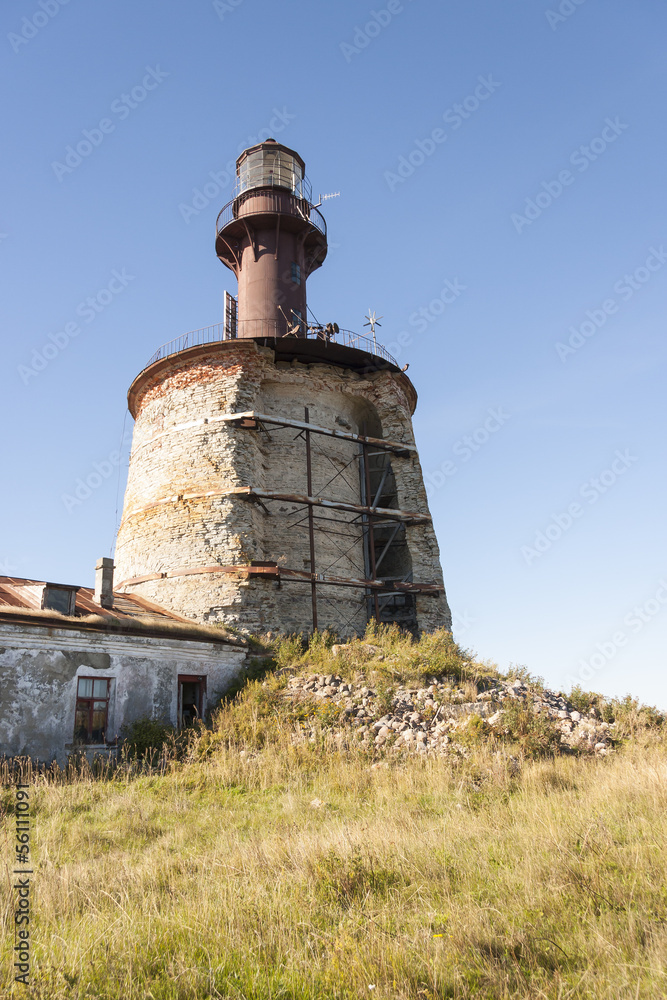 Ancient lighthouse on an island Ancient lighthouse on an island