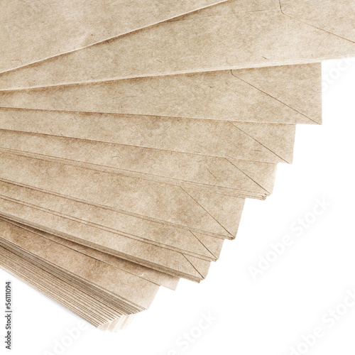 Stack Of Recycled Paper envelopes isolated on white background,