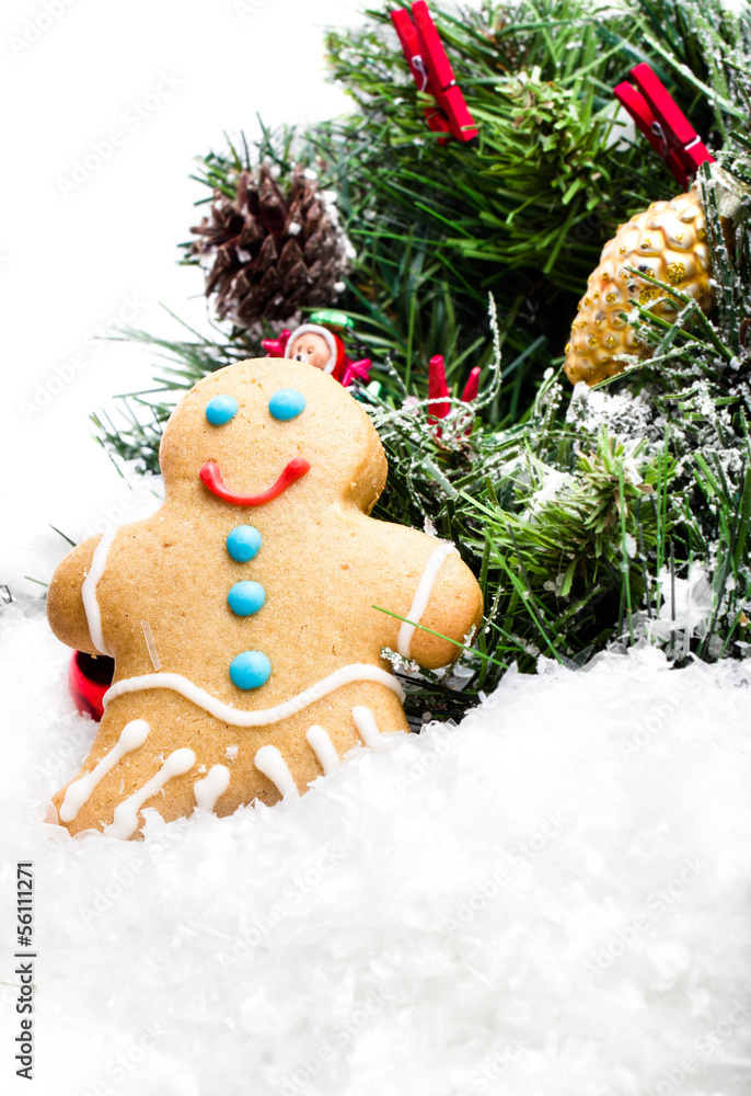 Gingerbread Man Christmas Cookie and Christmas decorations on w Gingerbread Man Christmas Cookie and Christmas decorations on w