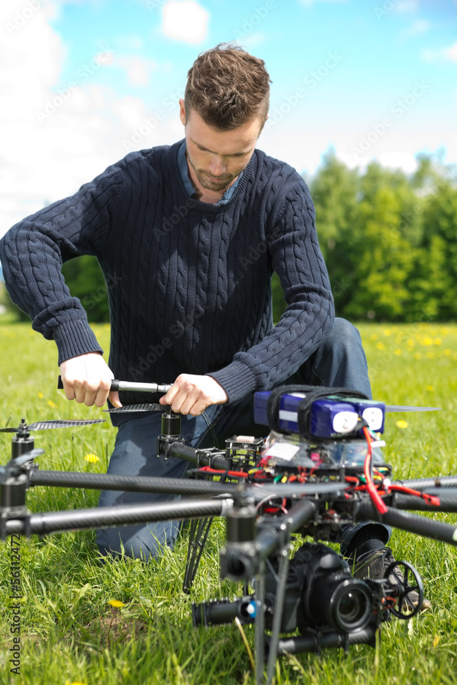 Fototapeta premium Technician Assembling Propeller Of UAV