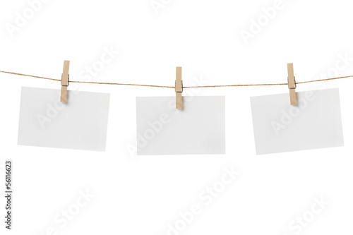 Foto paper cards hanging on the rope