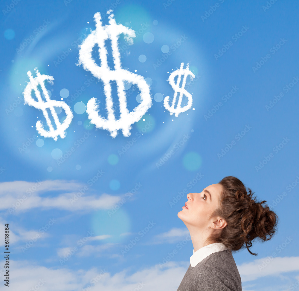 Young girl pointing at dollar sign clouds on blue sky Young girl pointing at dollar sign clouds on blue sky