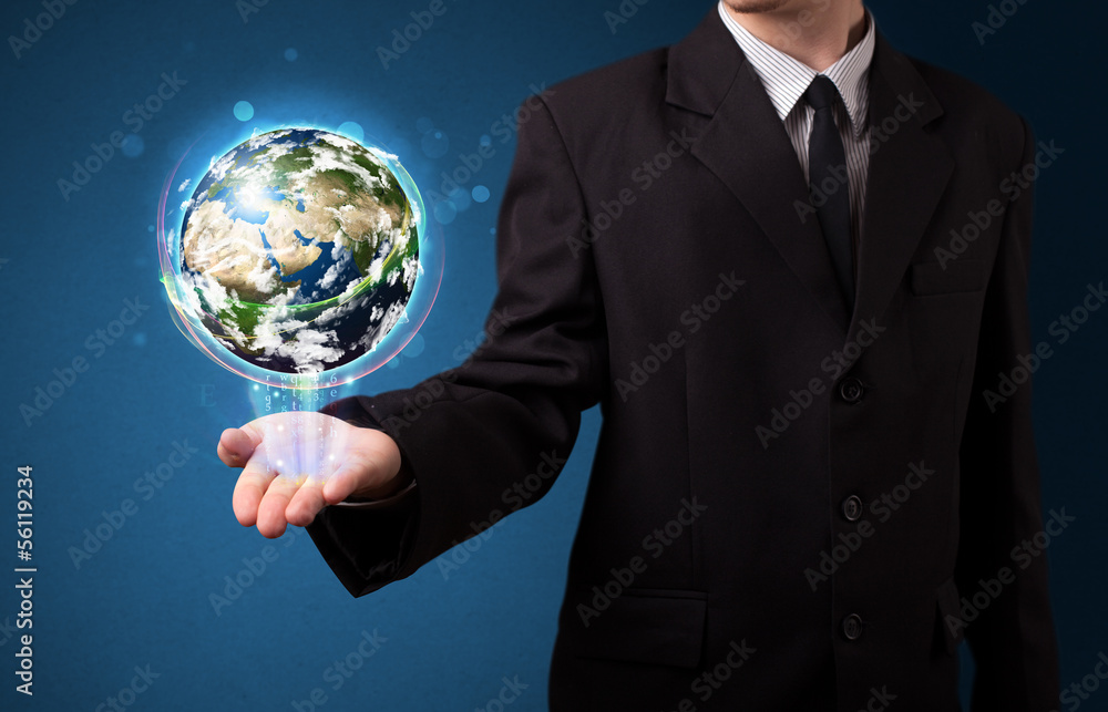 Businessman holding glowing earth globe Businessman holding glowing earth globe