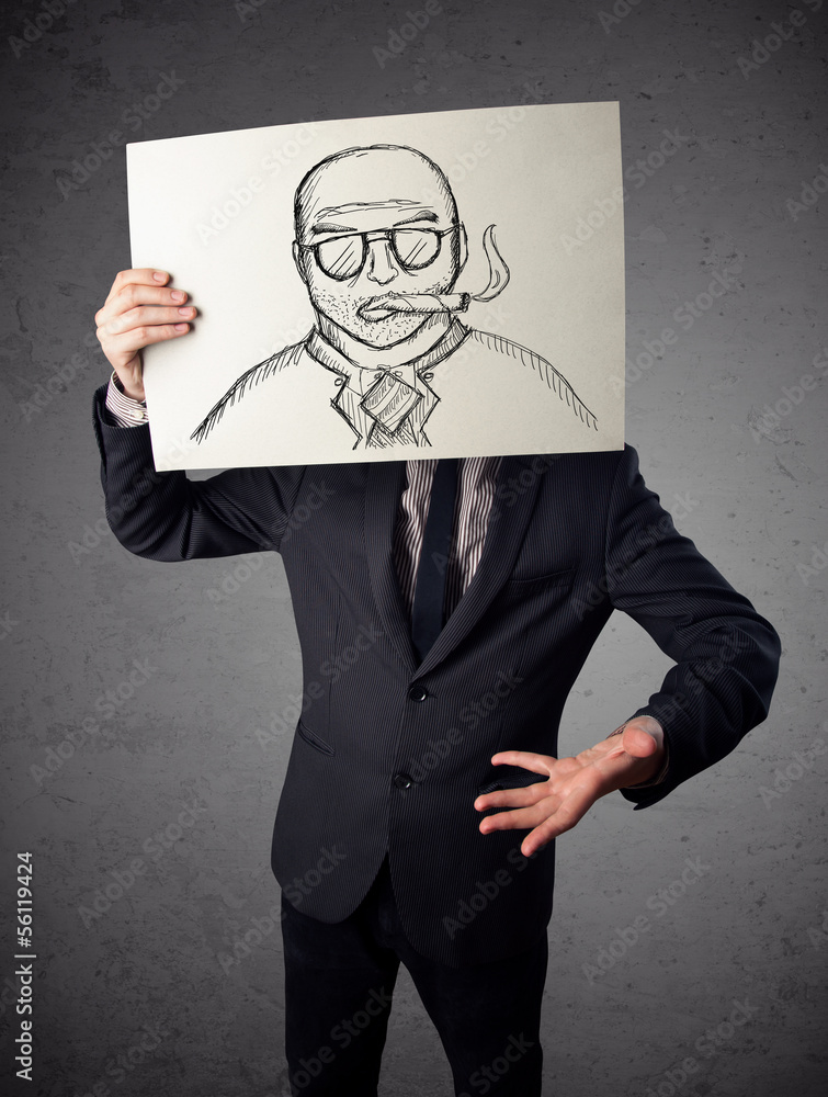 Businessman holding a cardboard with a smoking man on it in fron Businessman holding a cardboard with a smoking man on it in fron