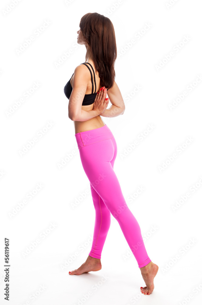 Pretty Woman in Yoga Pose - Reverse Pray Position. Pretty Woman in Yoga Pose - Reverse Pray Position.