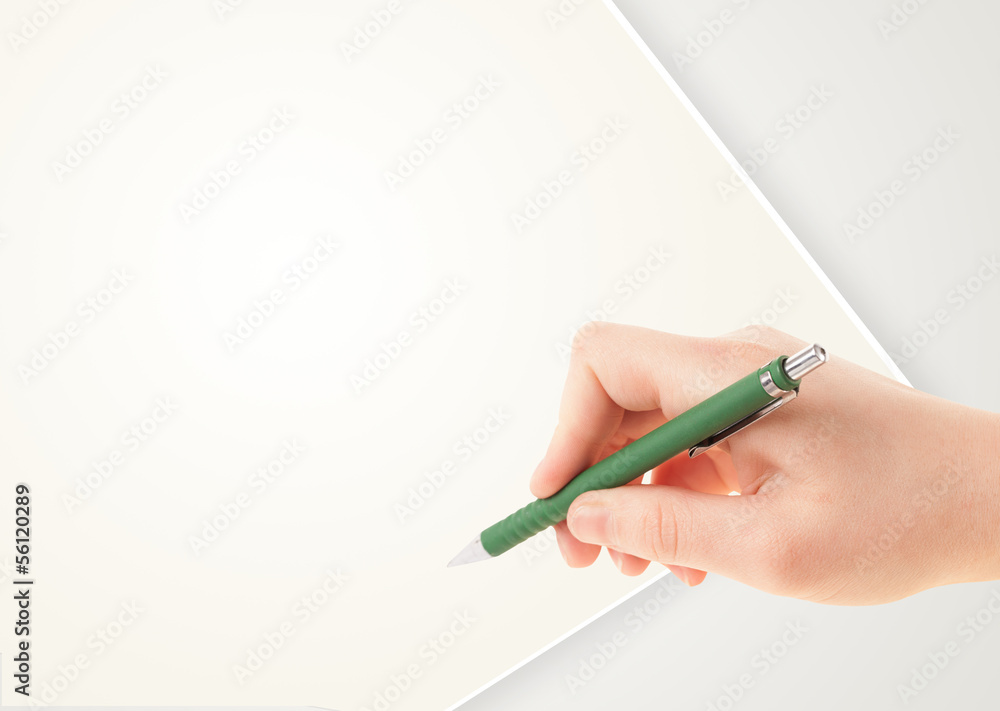 Hand writing on plain empty white paper copy space Hand writing on plain empty white paper copy space