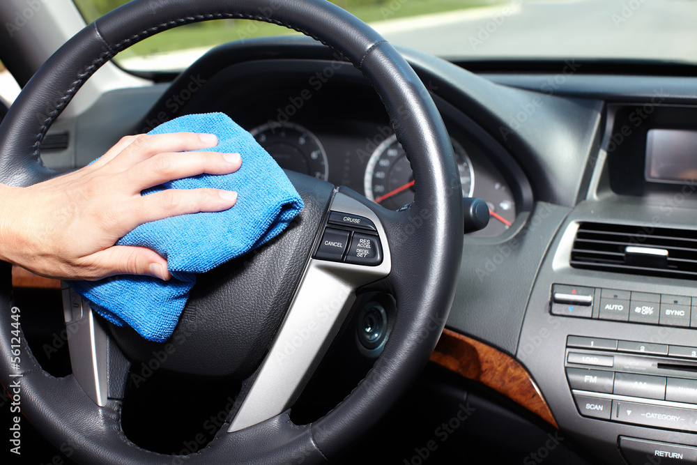 Hand cleaning car.