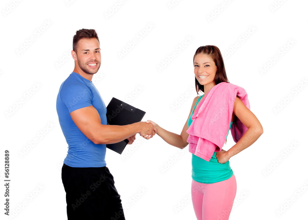 Handsome personal trainer with a attractive girl Handsome personal trainer with a attractive girl