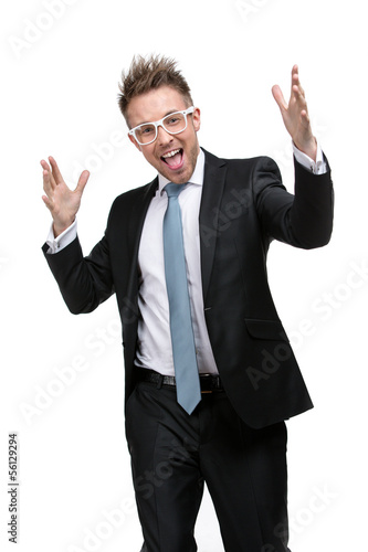 Half-length portrait of charismatic businessman with hands up