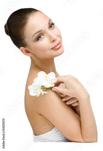 Portrait of girl handing white orchid, isolated on white