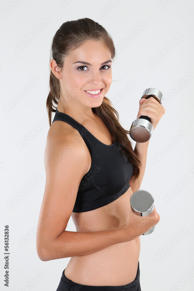 Beautiful young girl doing exercises at home Beautiful young girl doing exercises at home