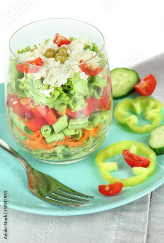 Tasty salad with fresh vegetables, isolated on white