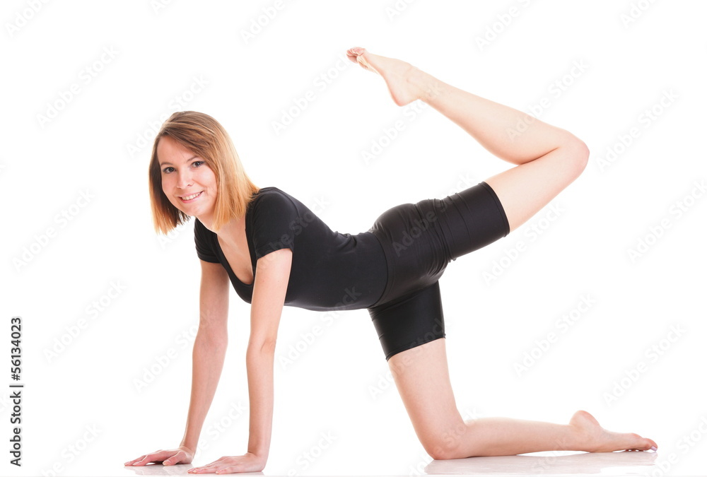 Sport Young woman doing exercise isolated on white Sport Young woman doing exercise isolated on white