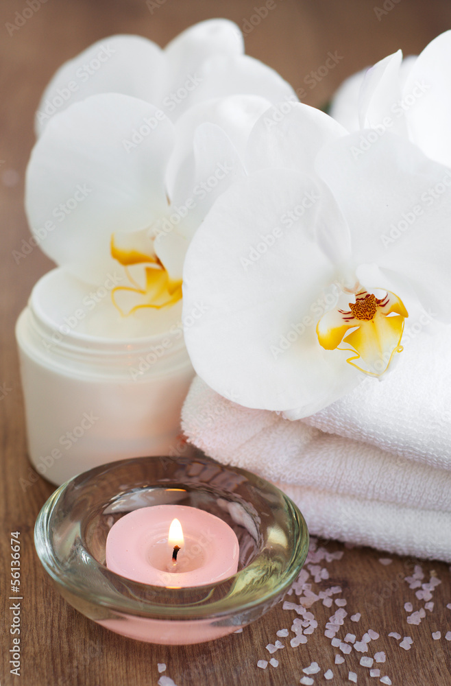Orchids and candle