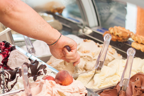 Selling ice-cream in Italian gelateria