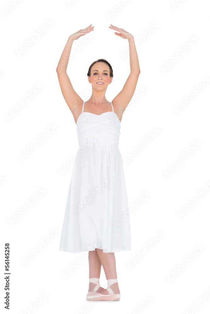 Peaceful young ballet dancer standing in a pose Peaceful young ballet dancer standing in a pose