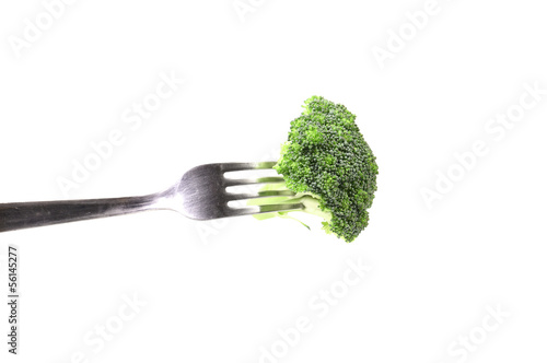 Broccoli floret on a fork.