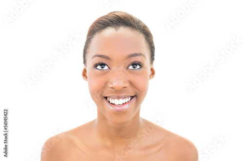 Portrait of smiling natural beauty looking up