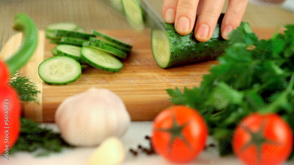 Female hands chopping vegetables Female hands chopping vegetables