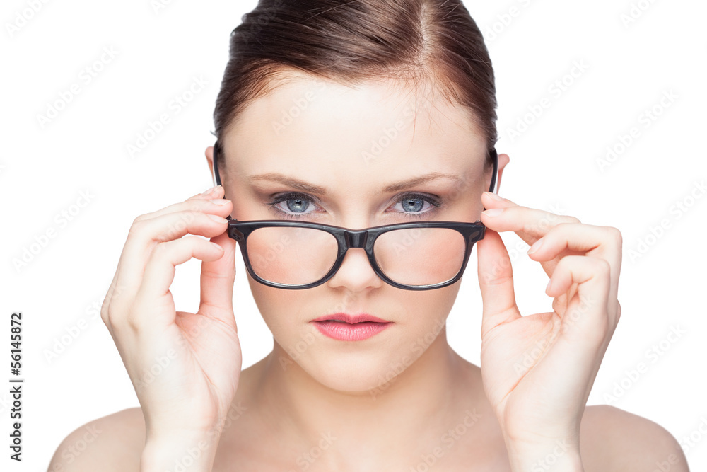 Content natural model looking over her classy glasses Content natural model looking over her classy glasses