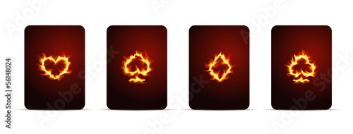 Vector illustration of playing card suits on fire