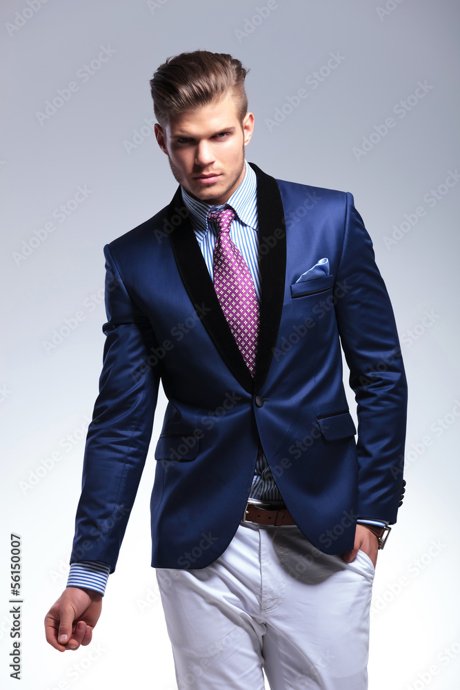 Fototapeta premium young business man posing with hand in pocket