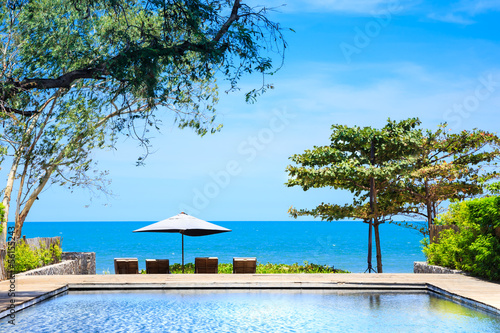 Beach side swimming pool at resort Thailand © wirojsid