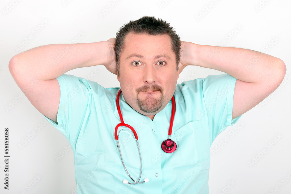 Medic with his hands to his head Medic with his hands to his head