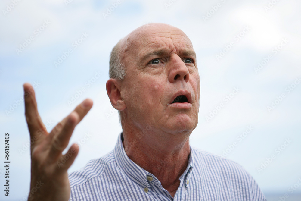 bald senior open-mouthed in surprise bald senior open-mouthed in surprise