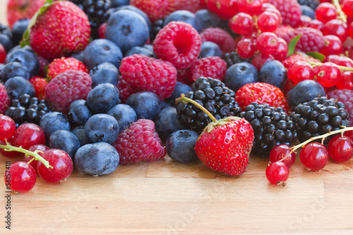 pile of fresh berries on table