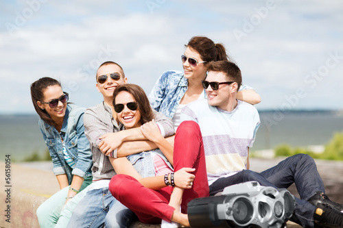 group of teenagers hanging out © Syda Productions