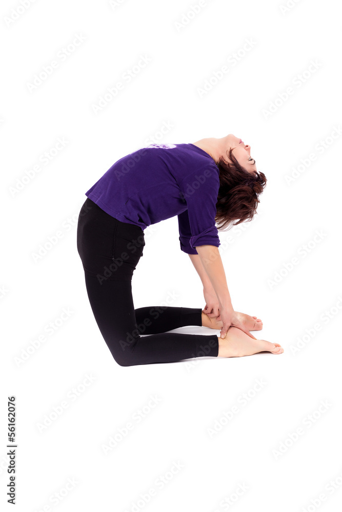 Woman performing yoga exercises