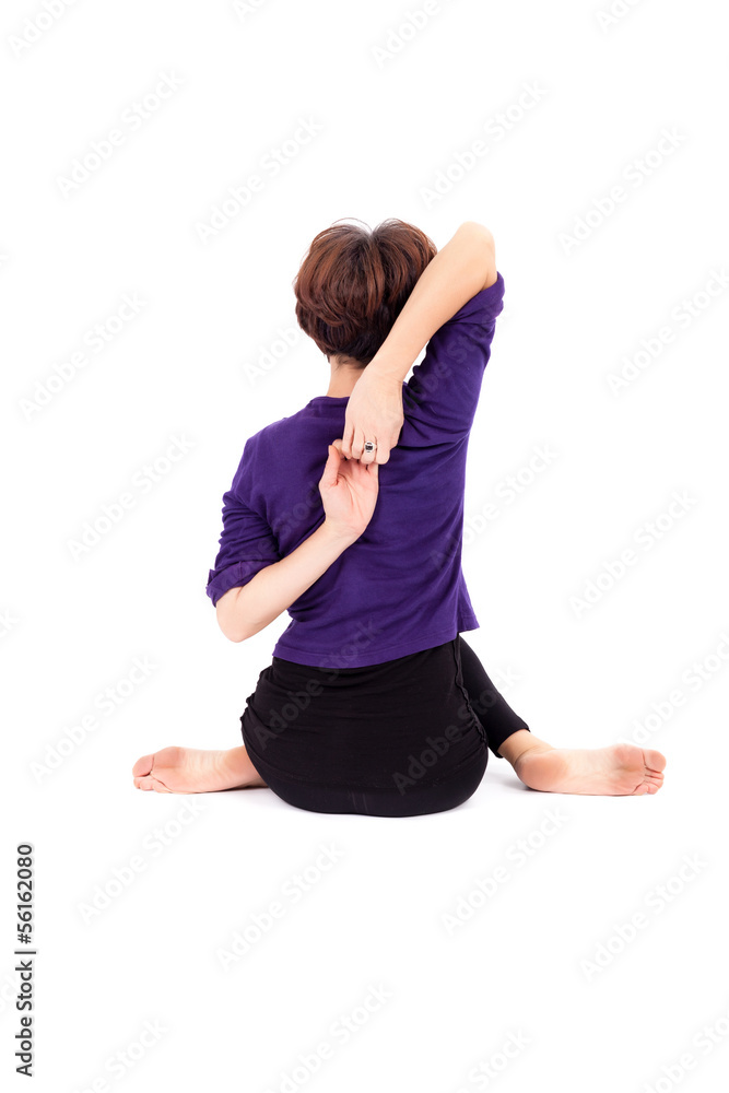 Woman performing yoga exercises Woman performing yoga exercises
