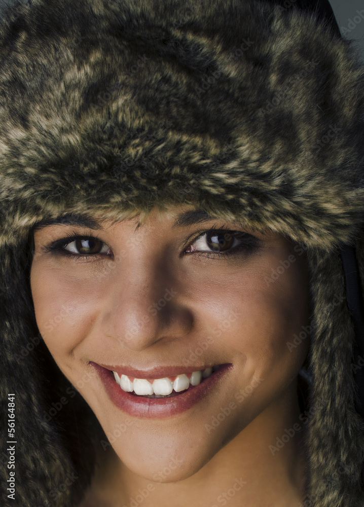 Happy smiling beautiful woman in fur hat Happy smiling beautiful woman in fur hat