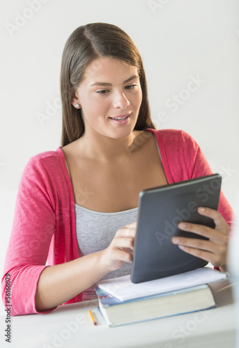 Beautiful Student Using Tablet In Classroom