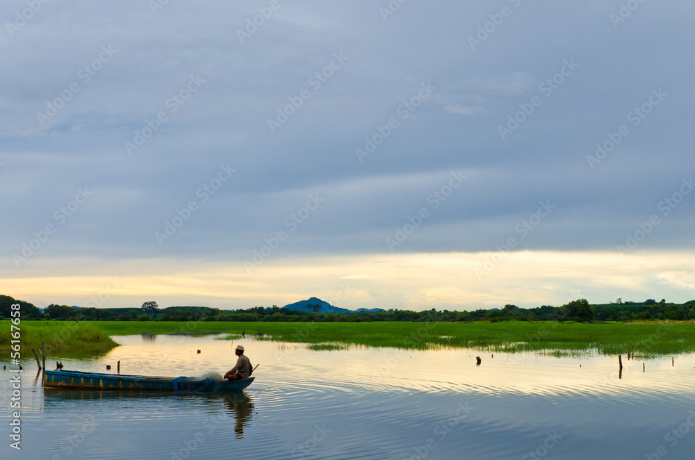 Fototapeta premium Fisherman in nature background