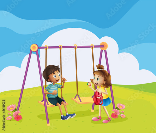 A boy and a girl at the playground