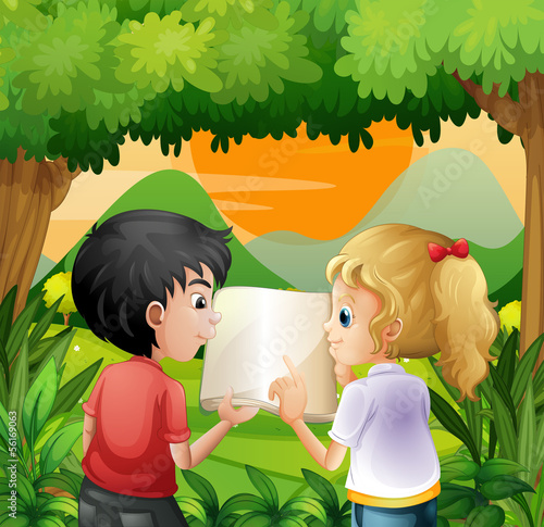 Kids discussing with a book at the forest