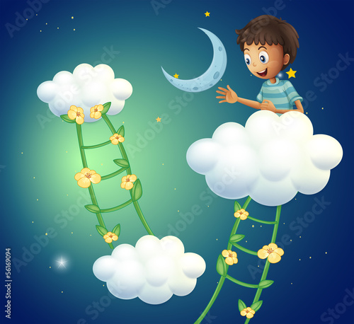 A happy boy at the top of the cloud