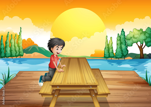 A table with bench near the river