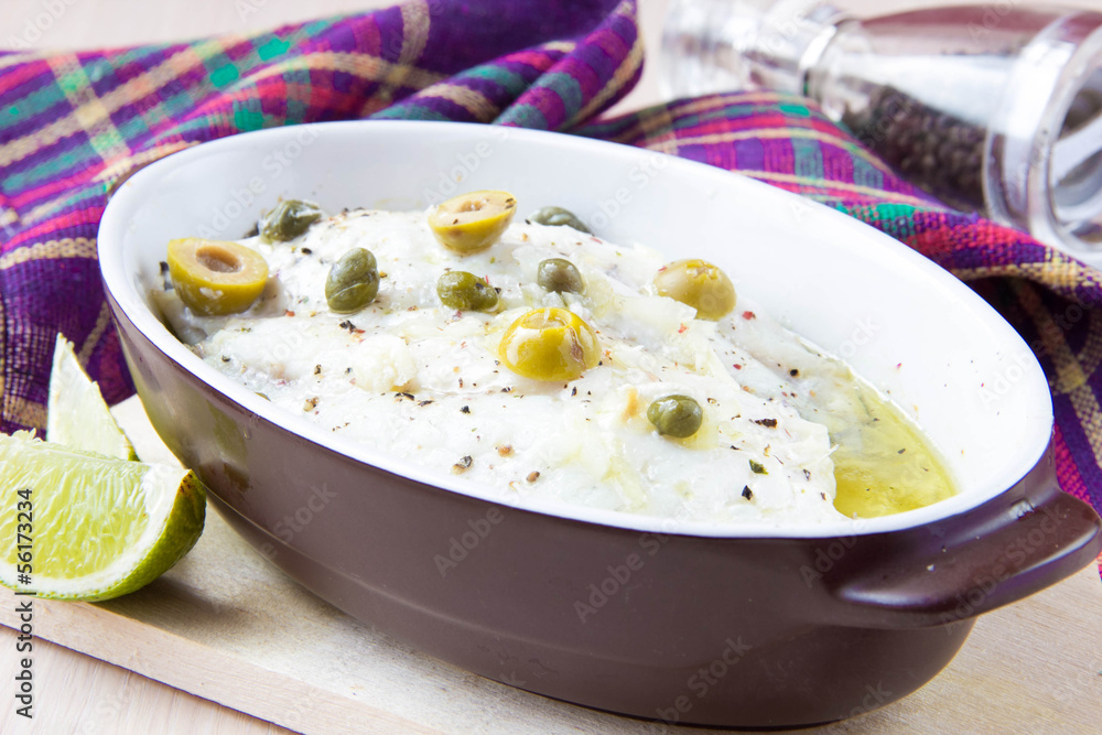 Baked filet of white fish Dorado with olives, capers, olive oil Baked filet of white fish Dorado with olives, capers, olive oil