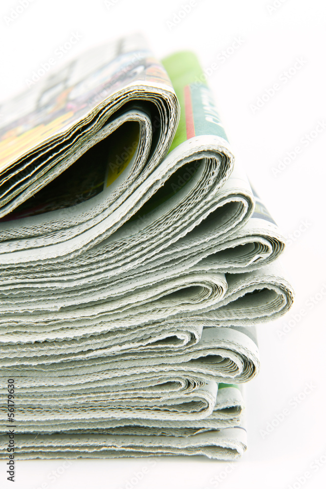 pile of newspapers isolated on white background pile of newspapers isolated on white background