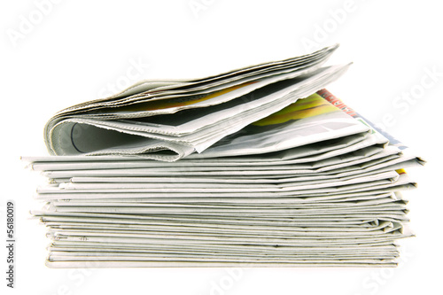 pile of newspapers isolated on white background