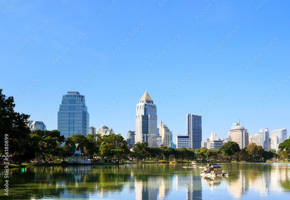 Business district cityscape from a park with blue sky Business district cityscape from a park with blue sky