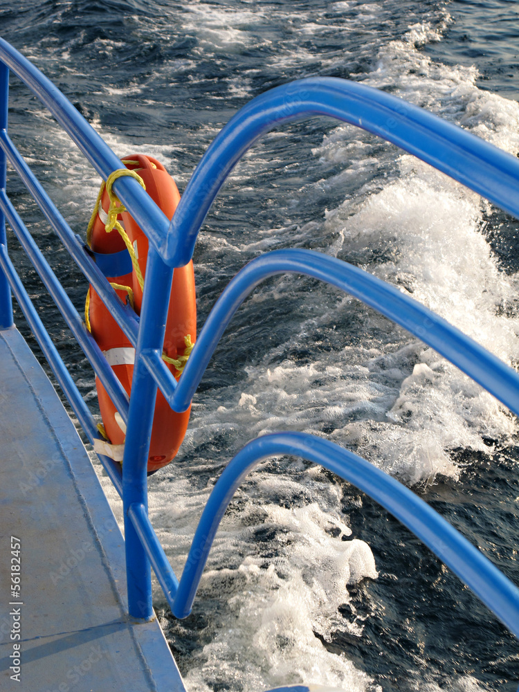  red lifebuoy blue sea