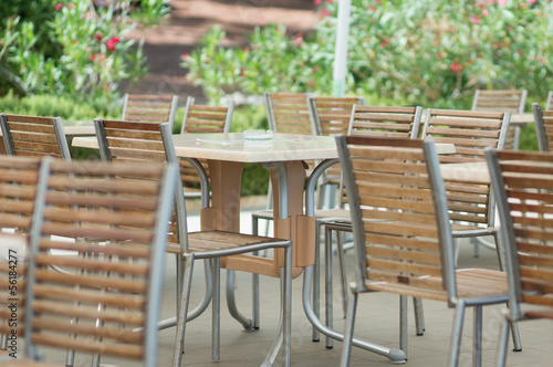 empty coffee shop tables and chairs © aerogondo