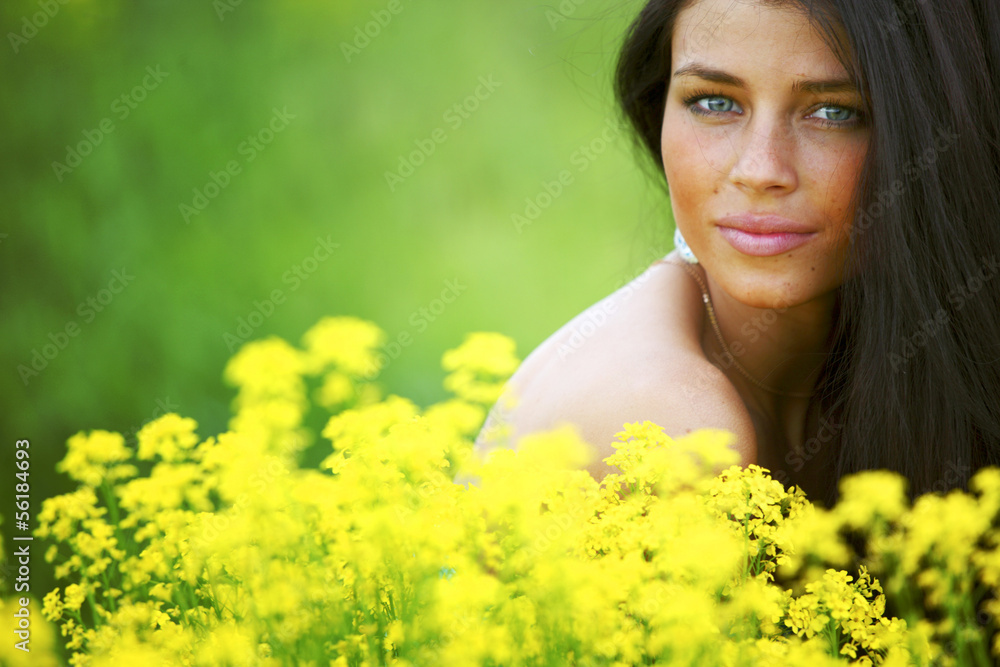 woman on oilseed field woman on oilseed field