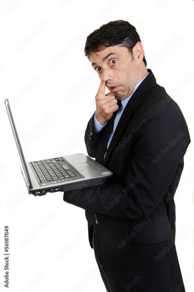 Businessman with his finger to his nose Businessman with his finger to his nose