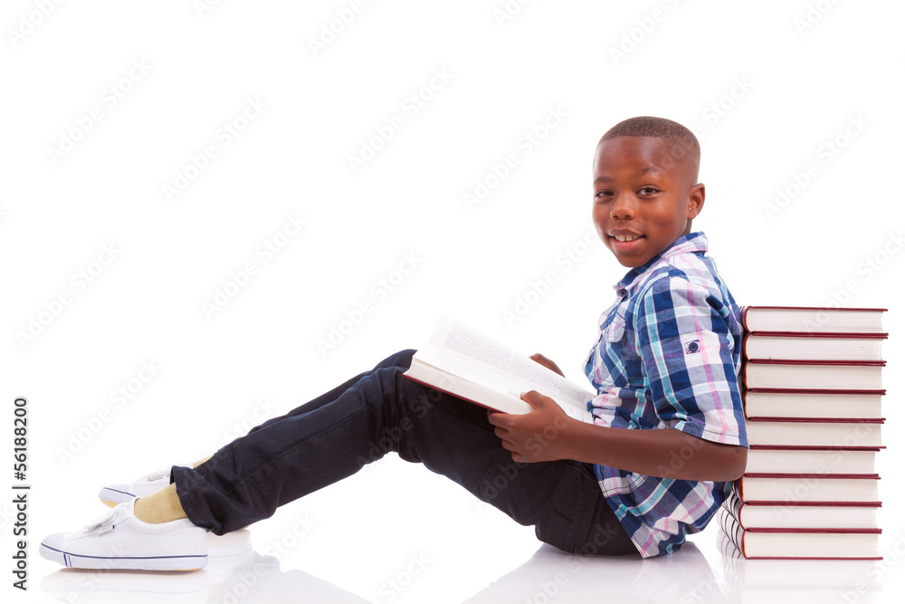 African American school boy reading a book - Black people African American school boy reading a book - Black people