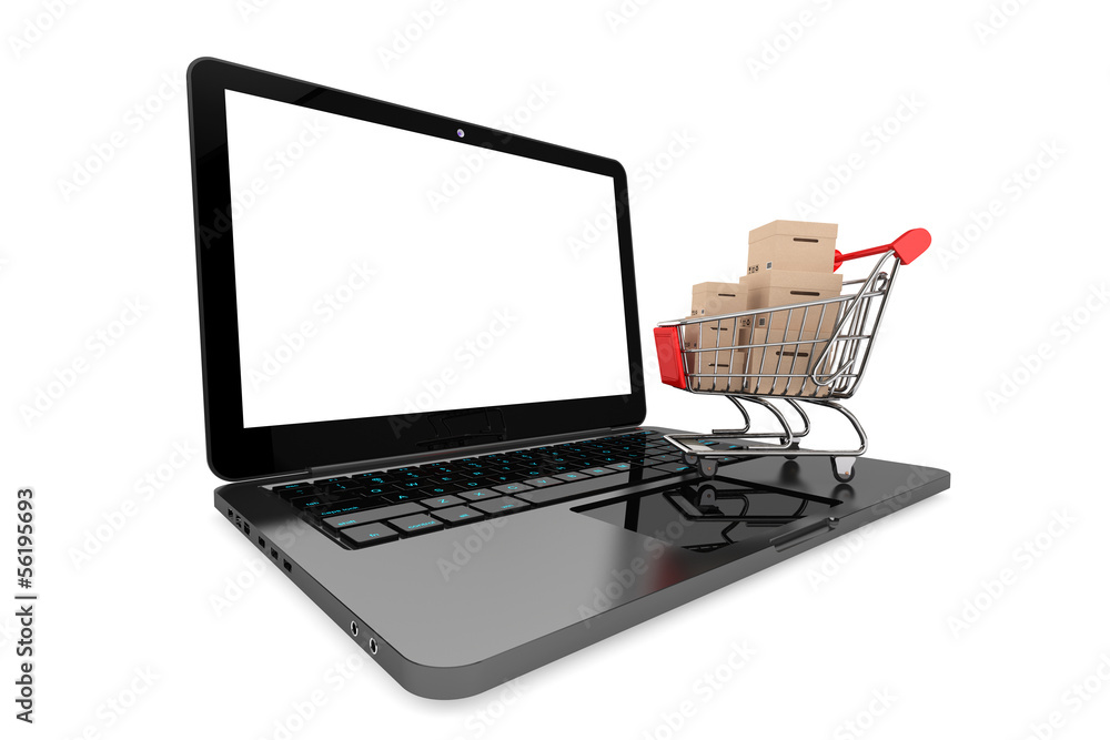 Online shopping concept. Shopping Cart with Boxes over Laptop